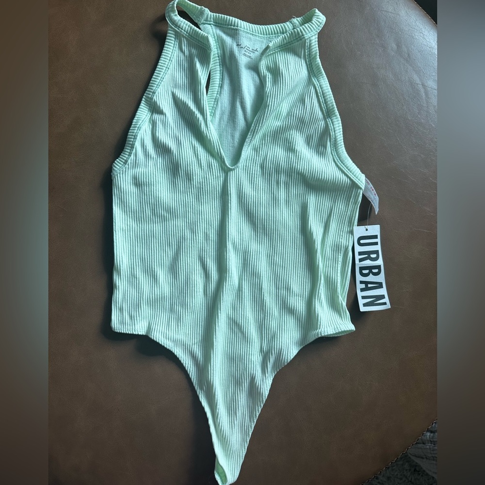 Urban Outfitters Brand New with tag! Stretchy light green body suit. Size XS/S